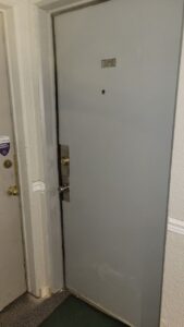 After - Door break in repair- broken by fire department